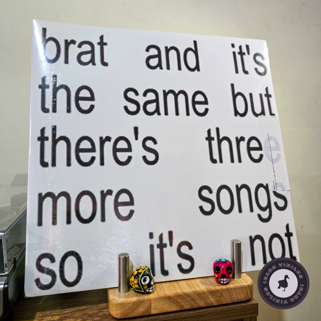 Brat and it's the same but there's three more songs so it's not - Charli XCX